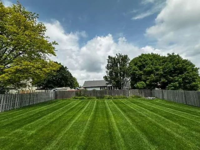 Local garden landscaping with custom design in Des Moines, IA by On Point Lawn & Landscape