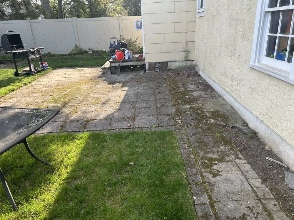 Professional lawn mowing service in Garden City, NY by On The Spot