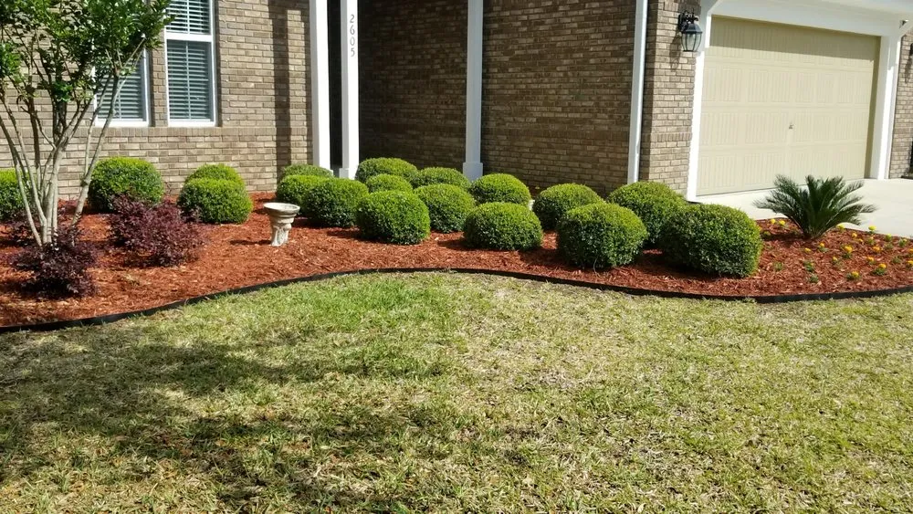 Affordable garden landscaping for residential properties across Southport, FL - On Track Lawn Care