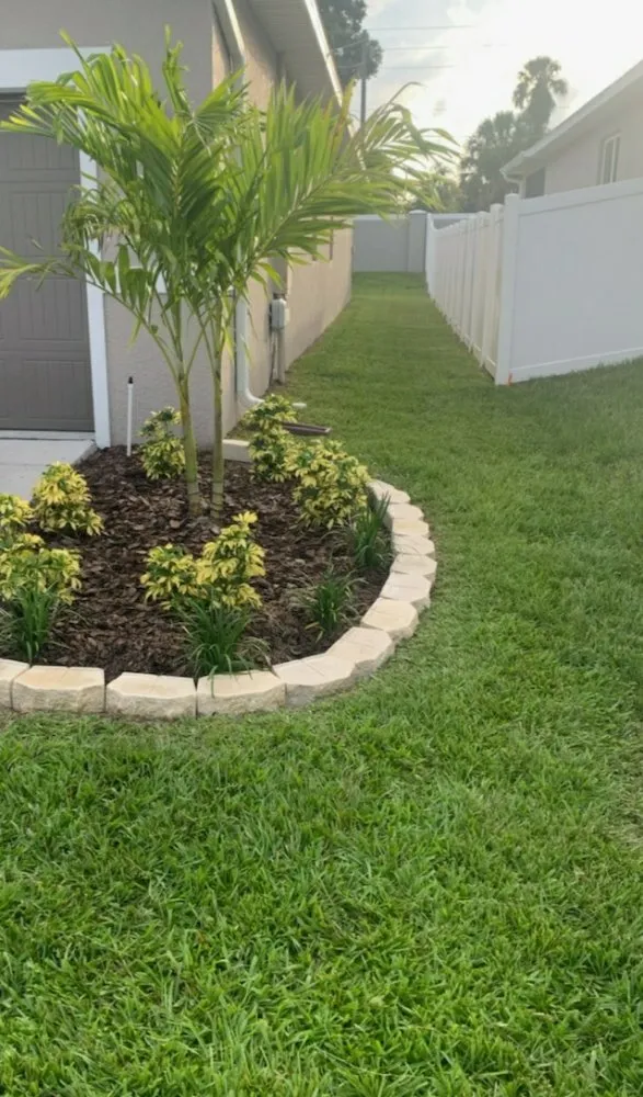 Custom garden landscaping in Auburndale, FL by One Call Away Lawncare and Landscaping