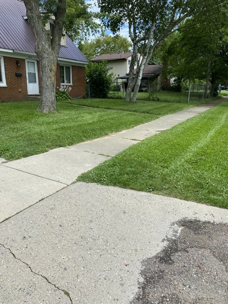 Professional lawn care service experts serving Lansing, MI - One Cut