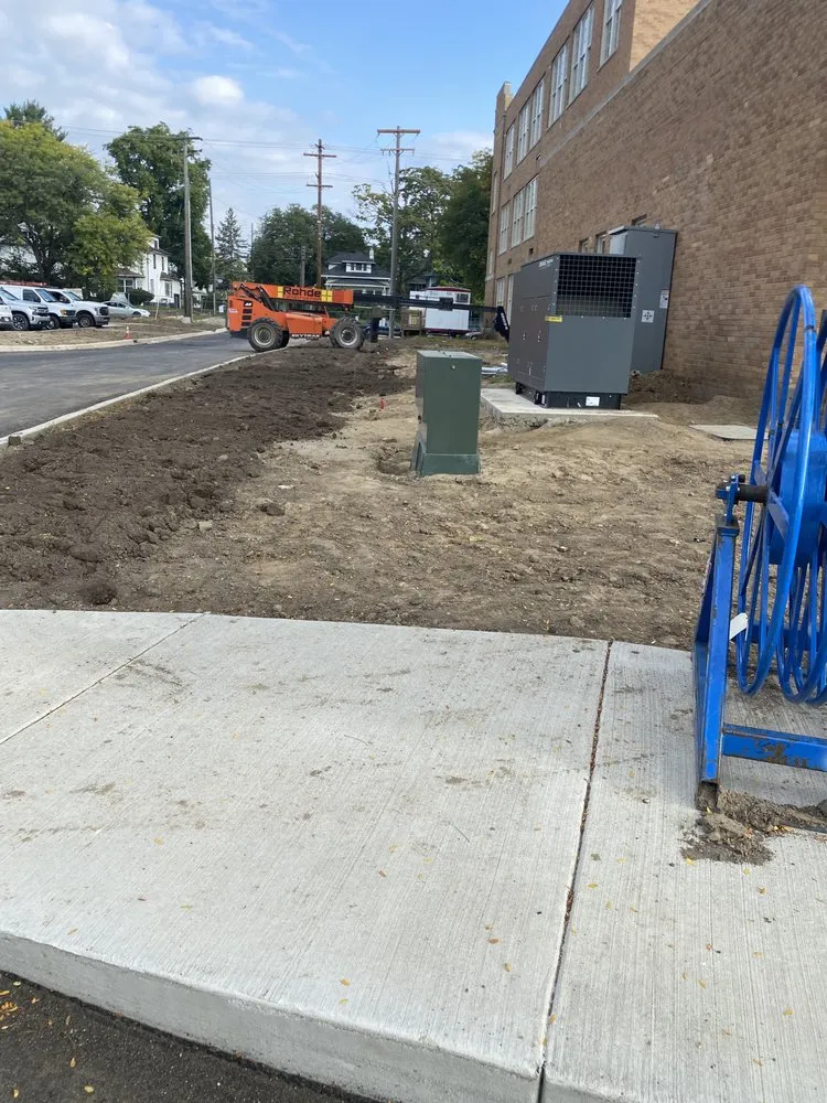 Expert yard cleanup service in Lansing, MI by One Cut