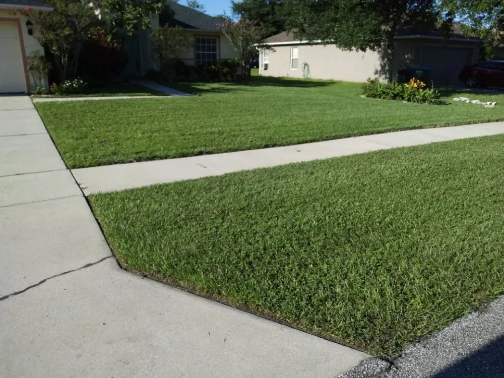 Custom lawn mowing service for beautiful yards across Deltona, FL - One For All Landscaping
