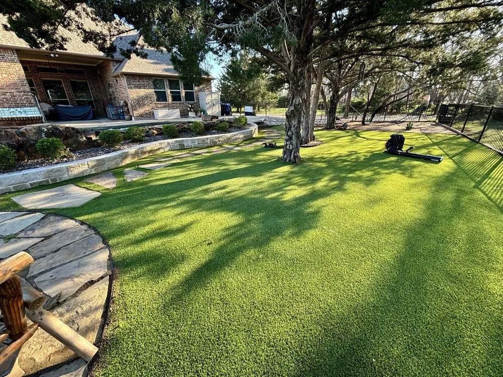 Professional landscape installation for residential properties in Fort Worth, TX by One Green Lawn Landscaping