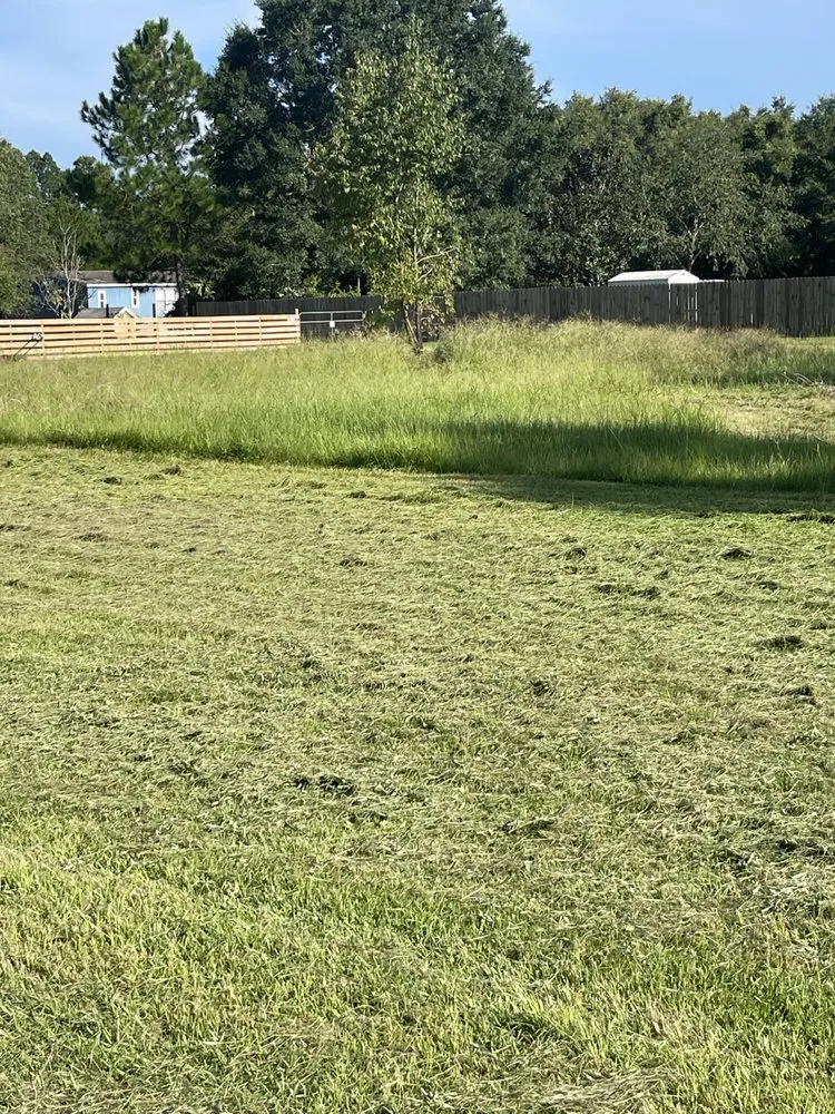 Professional lawn mowing service with custom design across Fernandina Beach, FL - One Oak Land Services