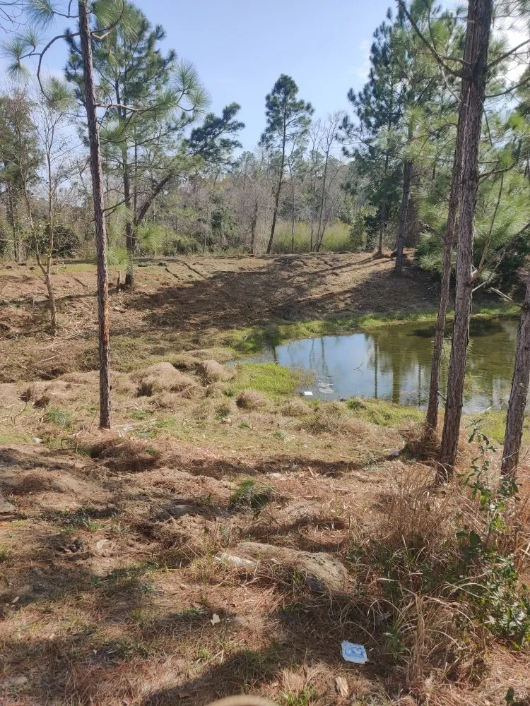 Custom garden landscaping in Loxley, AL by One Shot Land Management