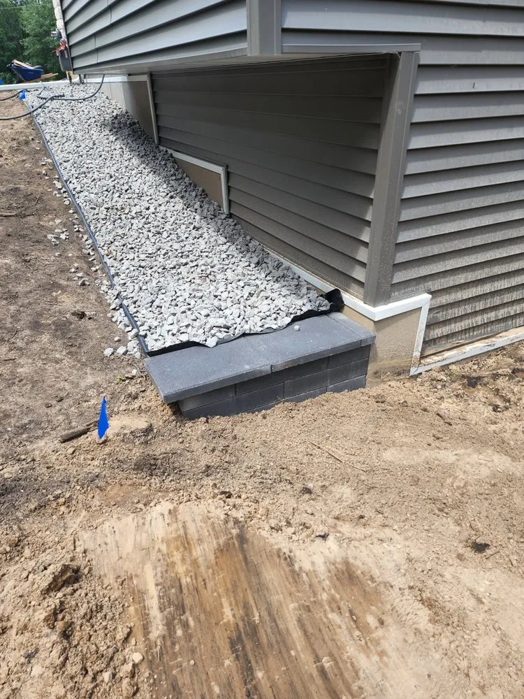 Custom landscape design for year-round maintenance in Zimmerman, MN by One Stop Outdoor Services