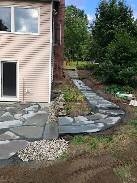 Professional yard cleanup service for homes in Norwich, VT by One Stop Property Maintenance