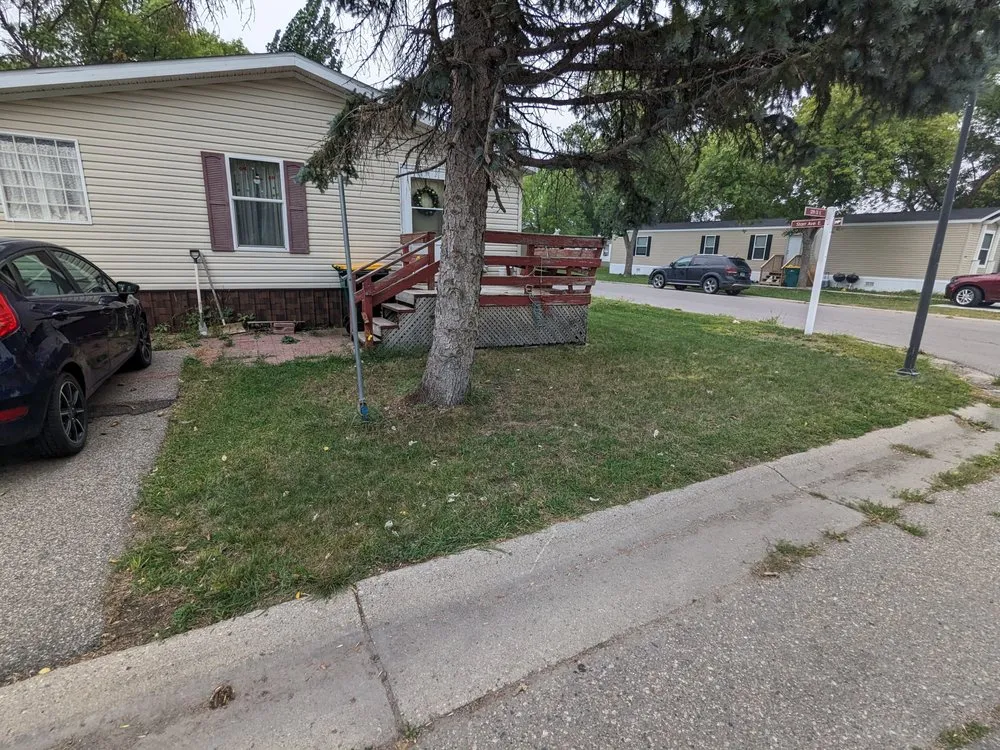 Local yard cleanup service for year-round maintenance across West Fargo, ND - One Universal Lawn Service