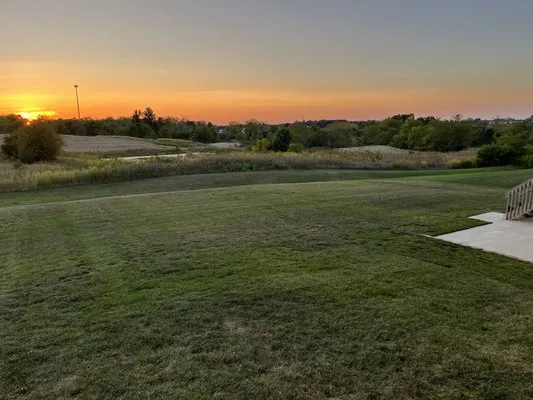 One Up Lawn Care Logo