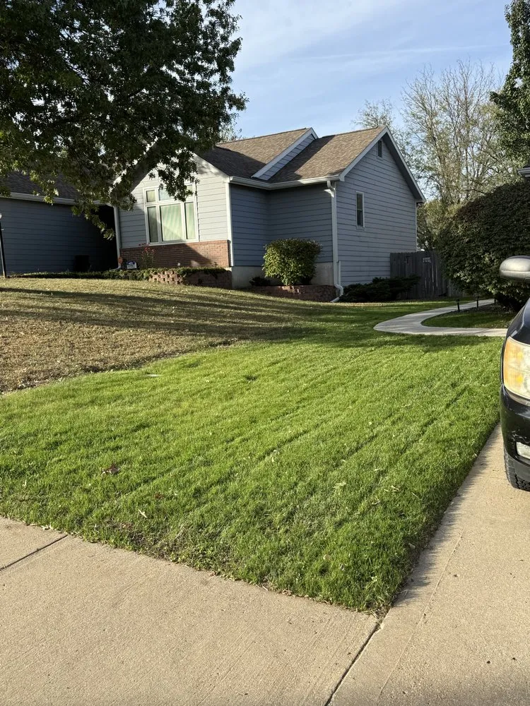 Custom lawn care service for homes in Lawrence, KS by One Up Lawn Care