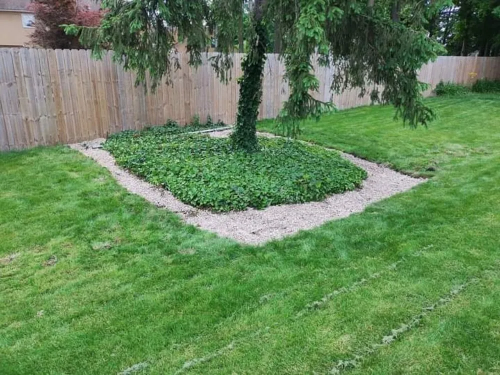 Local landscape design with custom design in Woodburn, IN by Oneth Lawn Services