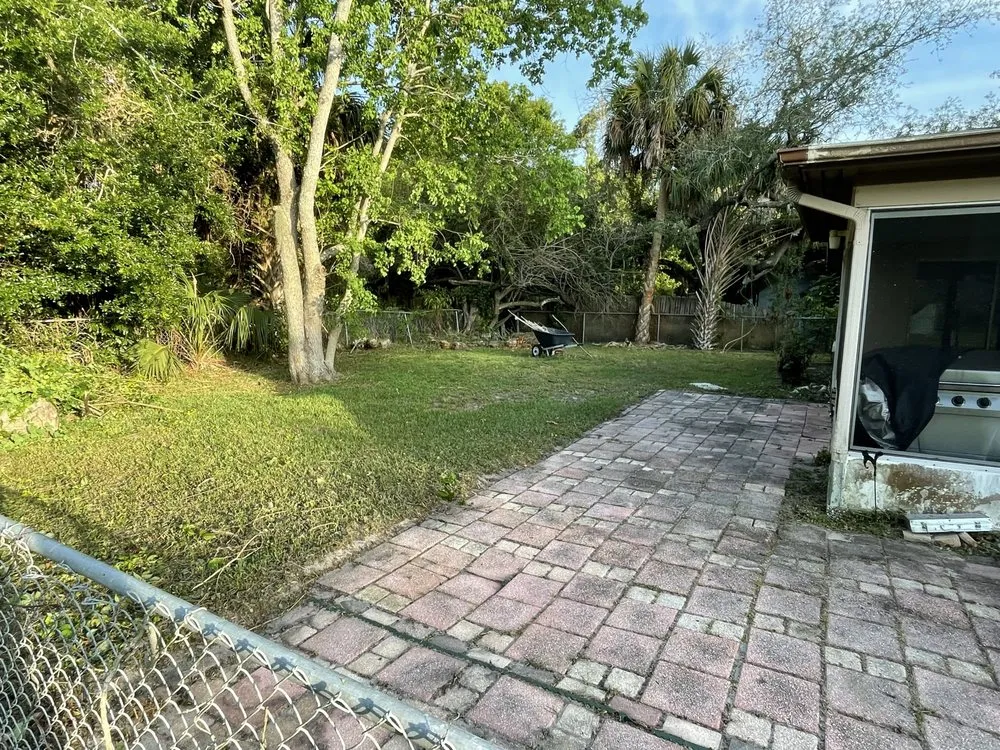 Professional yard cleanup service near you in Ruskin, FL by Optimum Lawn Care Services