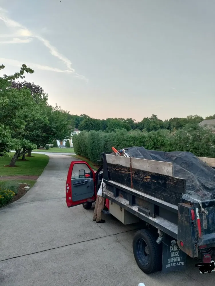 Local landscape installation for year-round maintenance in North Providence, RI by Optimus Tree Service and Landscaping