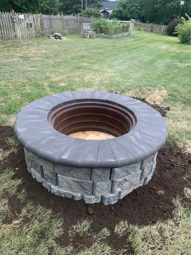 Expert yard cleanup service for year-round maintenance in Kansas City, KS by Orange Landscaping