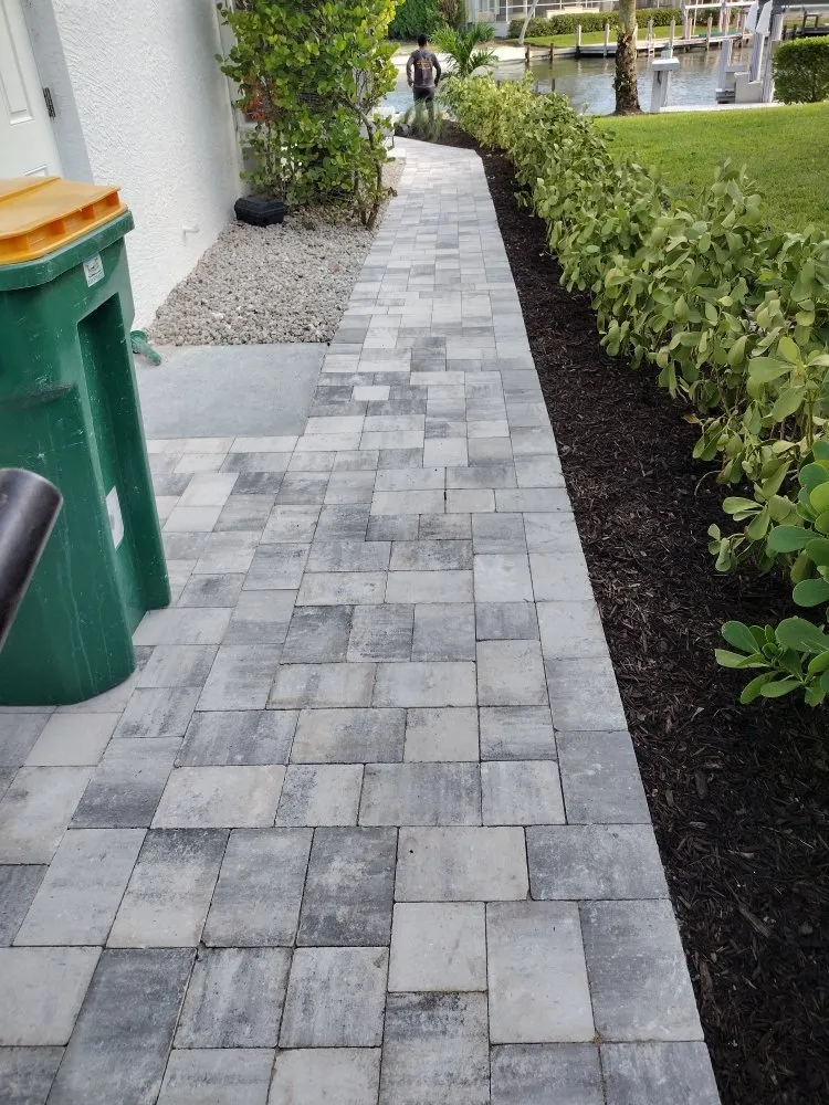 Expert outdoor landscaping for residential properties in Naples, FL by Orchid Lawn Services