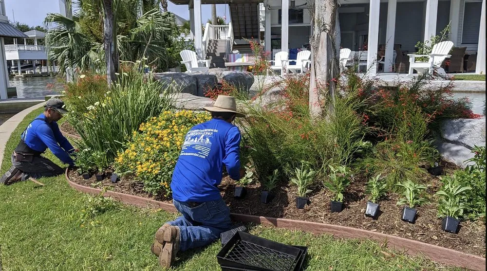 Custom landscape installation for beautiful yards in Galveston, TX by Orellana's Lawn & Garden