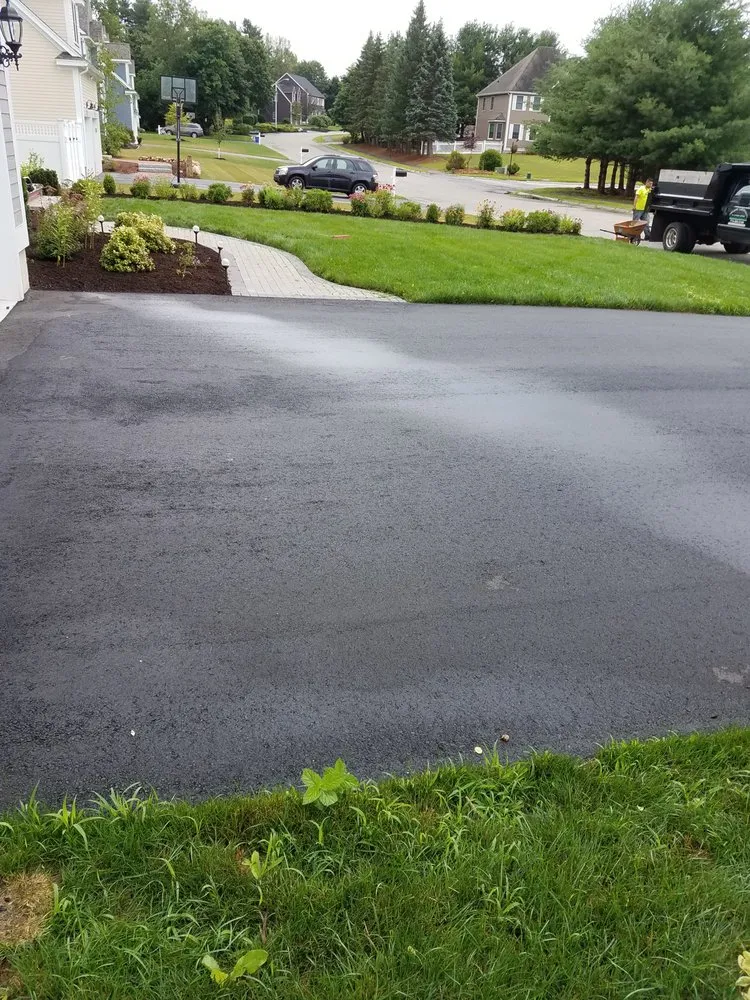 Professional lawn care service experts serving Marlborough, MA - Organic Gardening & Landscaping