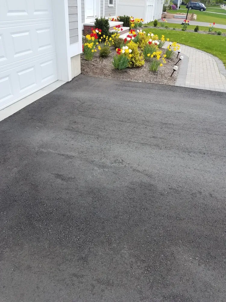 Affordable yard cleanup service for outdoor upgrades in Marlborough, MA by Organic Gardening & Landscaping