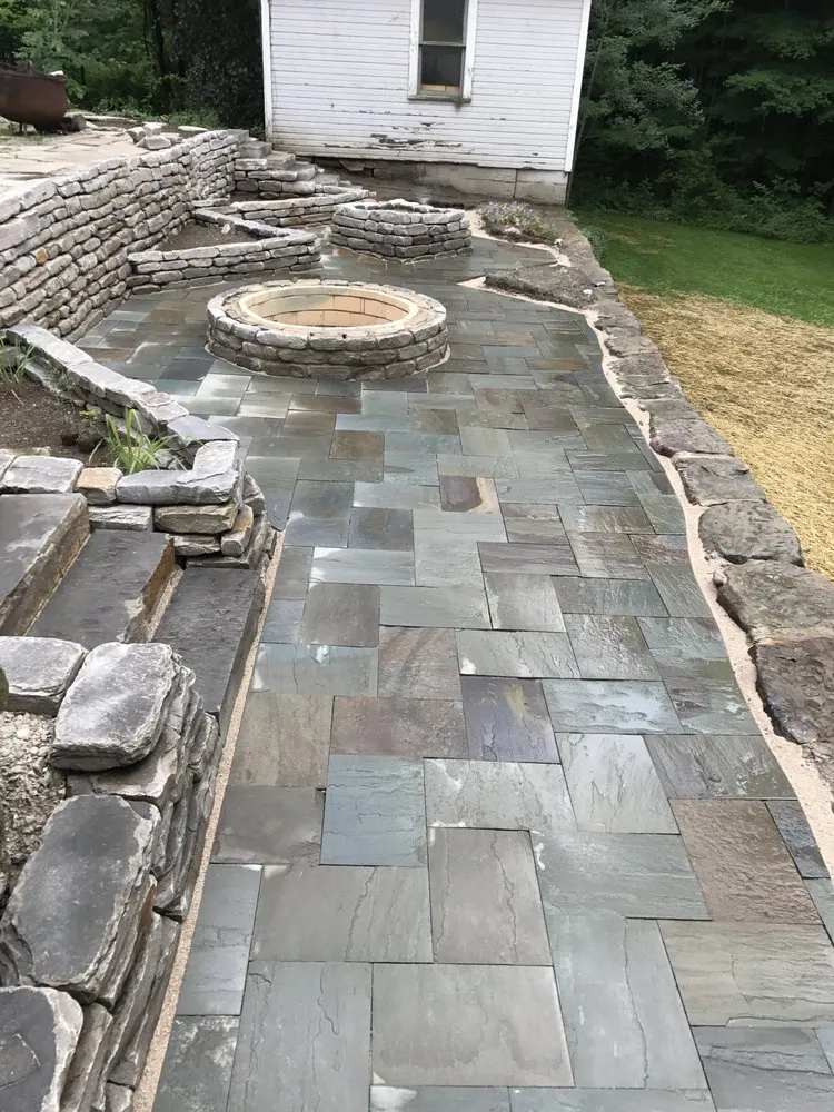 Affordable landscape installation for beautiful yards in Ravenna, OH by Organic Roots Horticulture