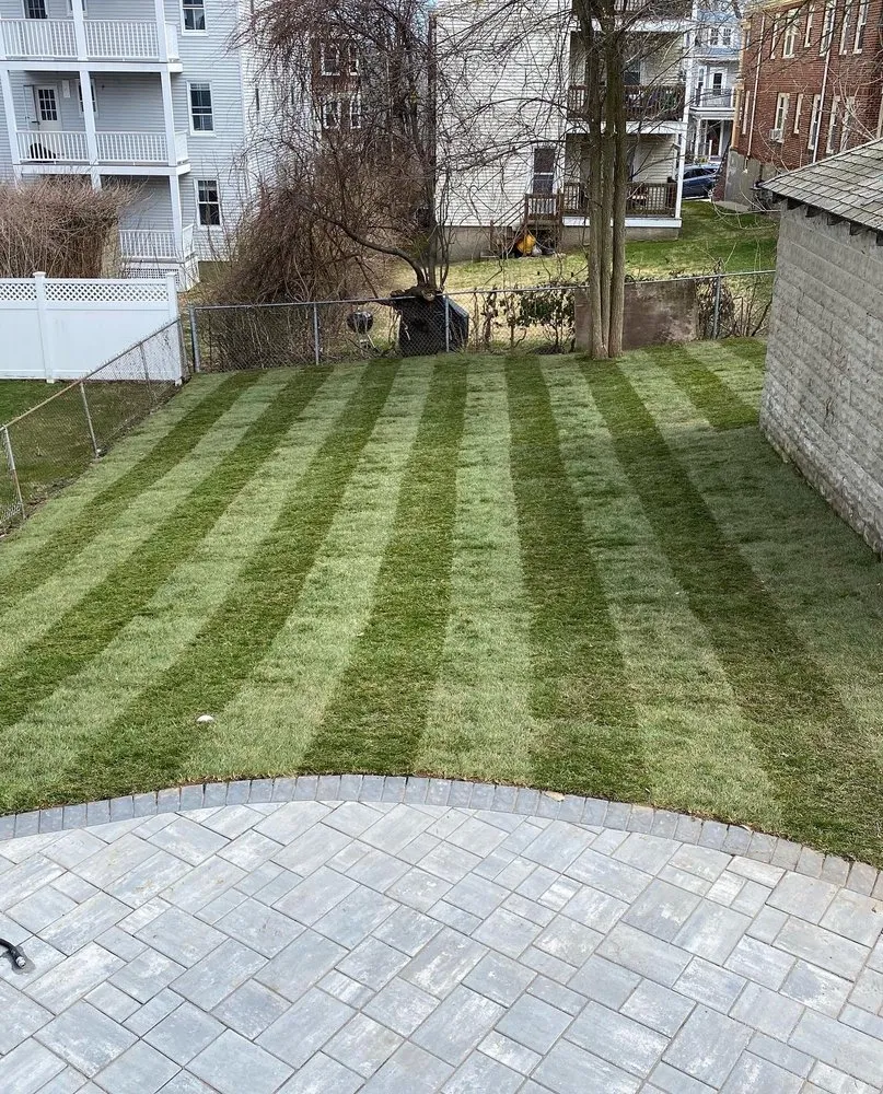 Custom landscape installation for beautiful yards in Spencer, MA by Orozco Landscaping