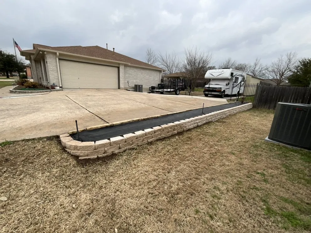 Affordable residential landscaping with custom design in Hutto, TX by Ortiz Landscaping