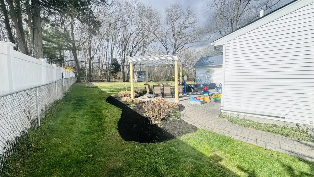 Affordable lawn care service for year-round maintenance across Coram, NY - Oscar G Landscaping