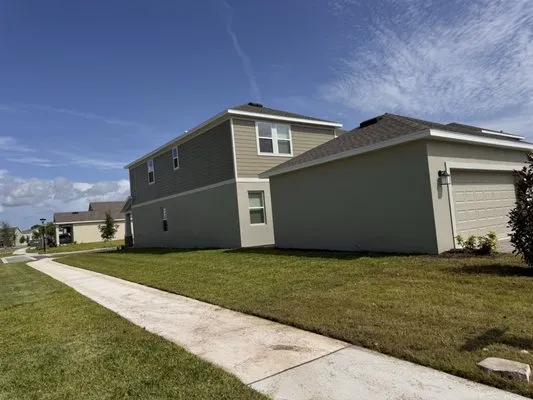 Osceola Finest Lawn Care Logo