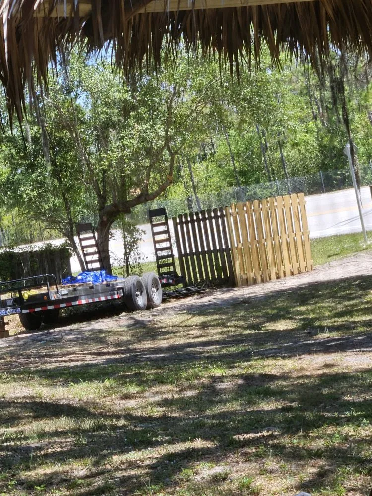 Custom lawn mowing service for residential properties in Okeechobee, FL by Osceola Outdoor Services