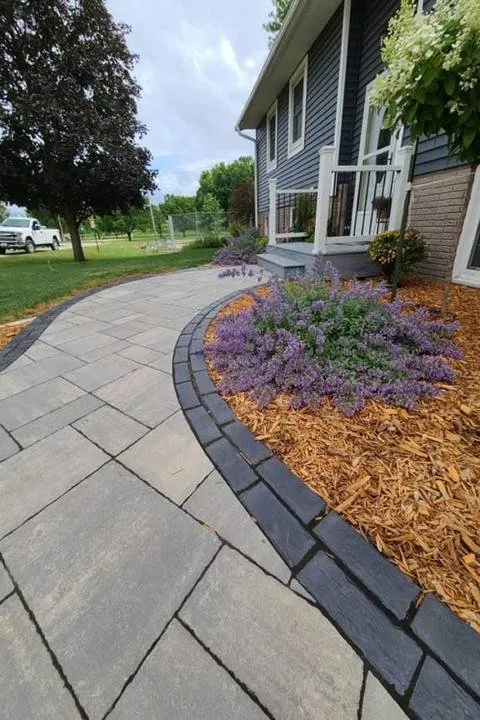 Custom residential landscaping for year-round maintenance across West Union, IA - Osmundson Professional Lawn Care Service & Landscaping