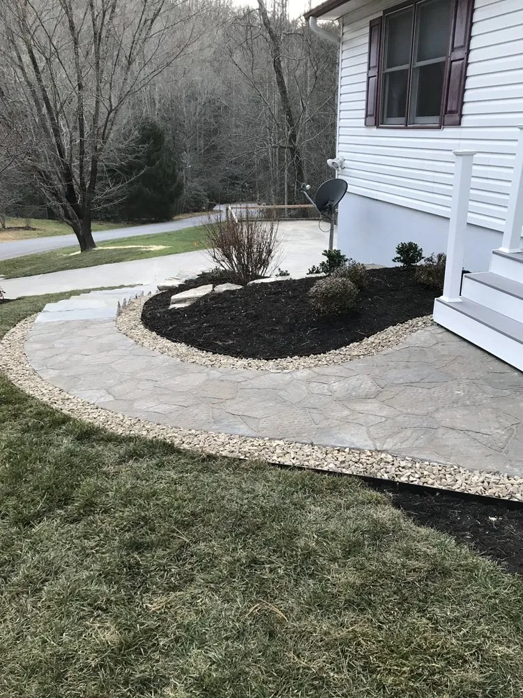 Custom landscape design for year-round maintenance across Fletcher, NC - Osteen Lawn and Landscape