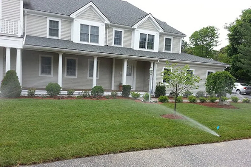 Reliable landscape installation with custom design in Bedford, MA by Ostiguy Landscape