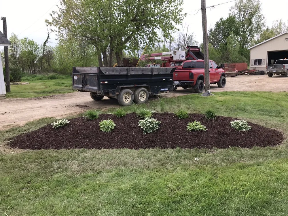 Local lawn mowing service for year-round maintenance in Sandusky, MI by Oswald Lawn & Tree