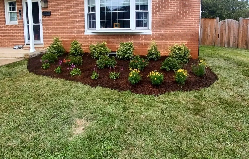 Custom landscape installation with custom design in Silver Spring, MD by Otego Valley Landscaping