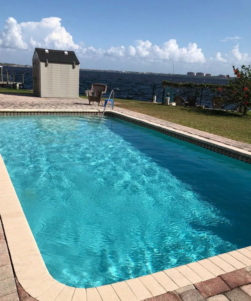 Custom landscape installation for residential properties in Cape Coral, FL by Other Side Lawn and Pool Care