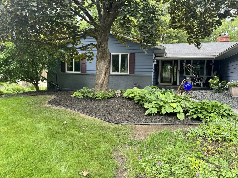 Reliable lawn care service with custom design across Elk Mound, WI - Our Family Lawn Care