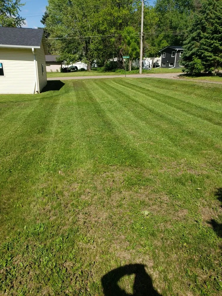 Custom garden landscaping in Elk Mound, WI by Our Family Lawn Care