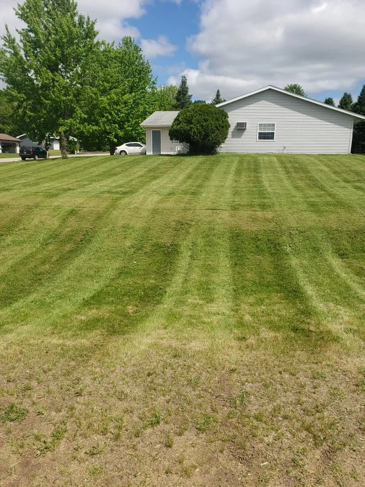 Reliable landscape design for homes in Elk Mound, WI by Our Family Lawn Care