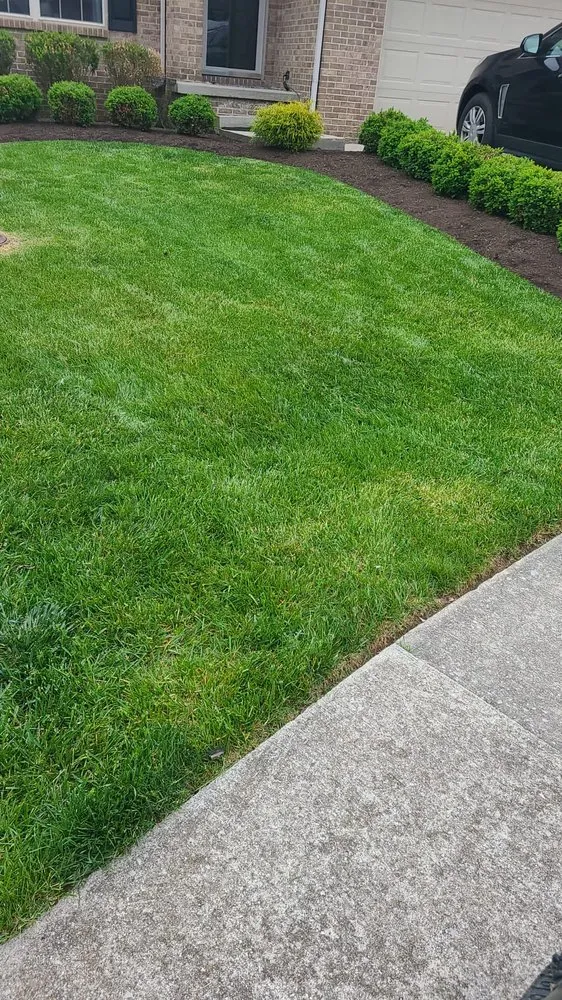 Trusted lawn mowing service for homes in Lexington-Fayette, KY by Out Serv Landscaping and More