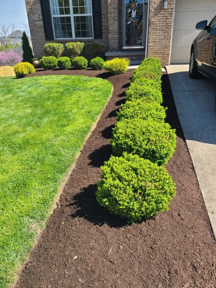 Custom landscape design in Lexington-Fayette, KY by Out Serv Landscaping and More
