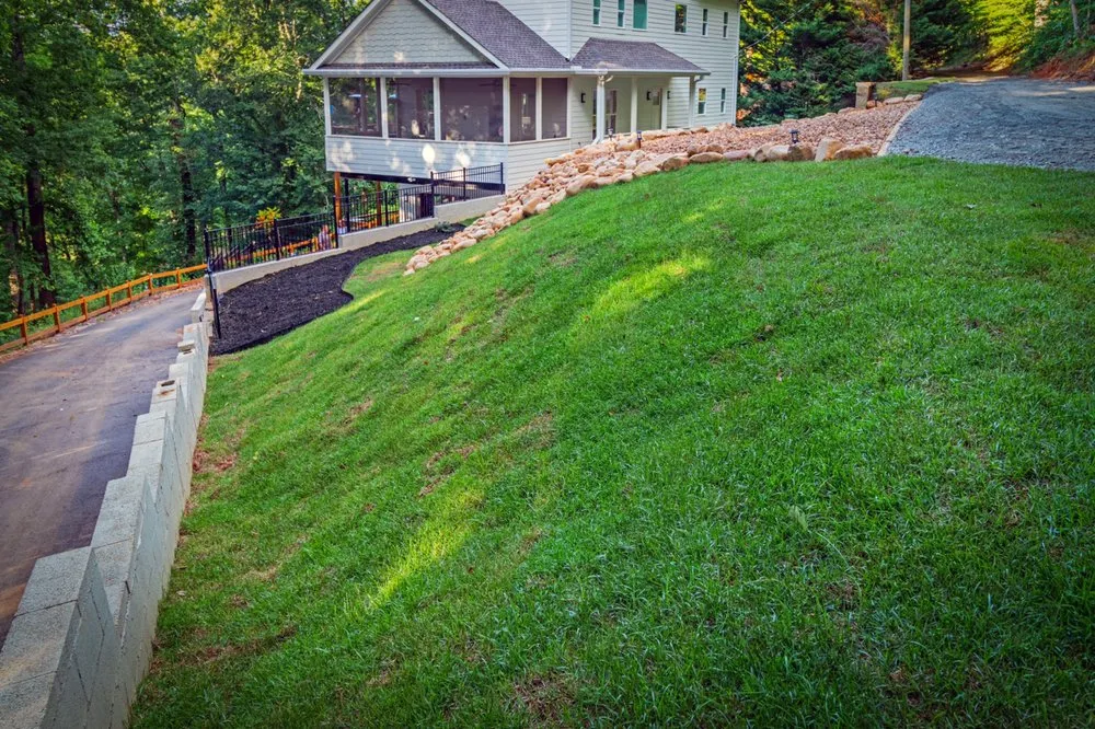 Custom garden landscaping with custom design in Dawsonville, GA by Out The Mud Erosion And Land Development