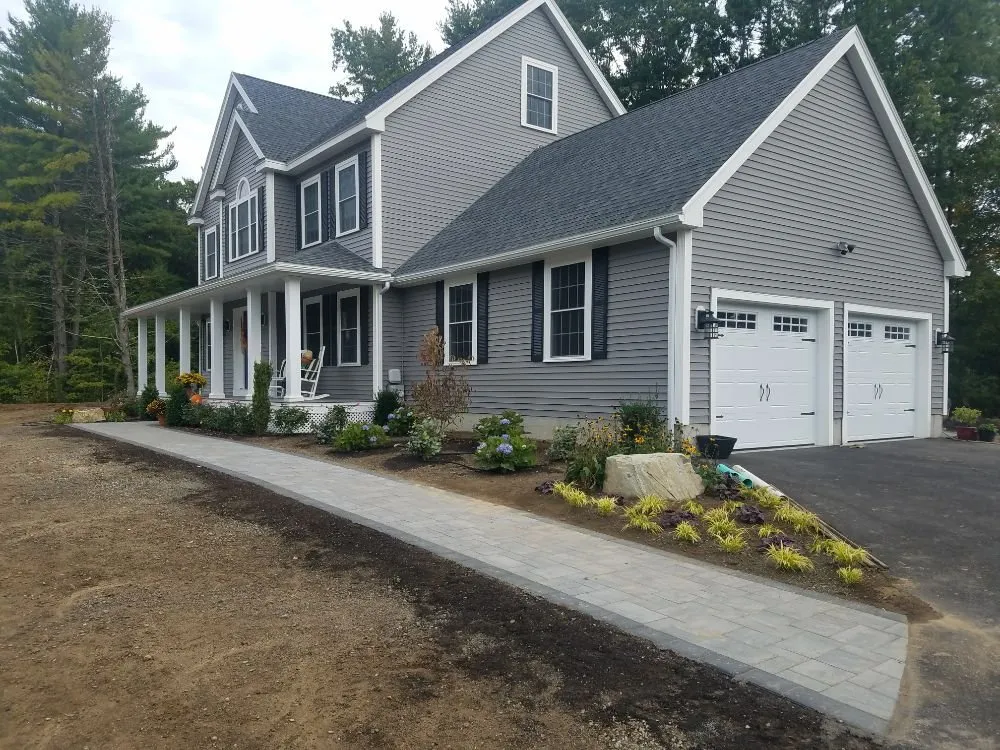 Affordable yard cleanup service in Woburn, MA - Outdoor Associates