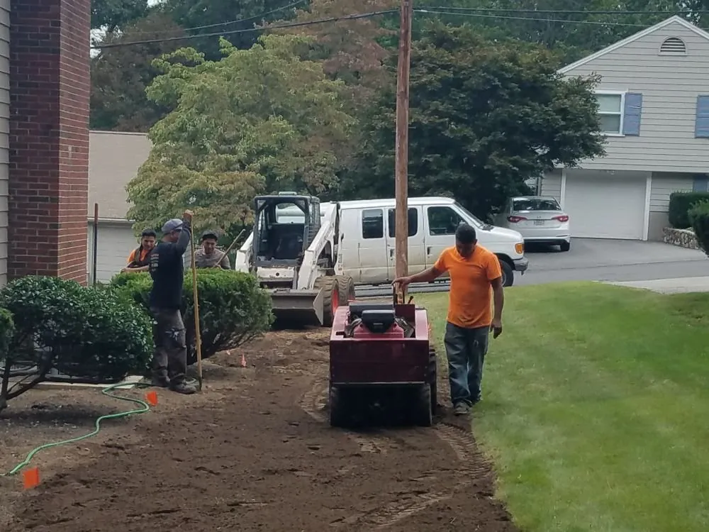 Affordable lawn mowing service in Woburn, MA by Outdoor Associates