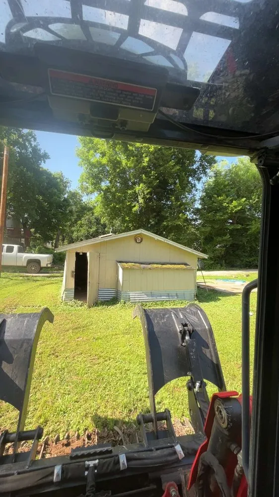 Professional landscape installation with custom design in Poplar Bluff, MO by Outdoor Cleanup