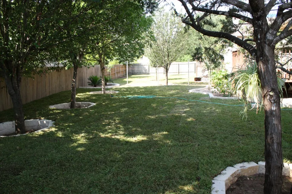 Custom lawn mowing service for residential properties in Hutto, TX by Outdoor Designs