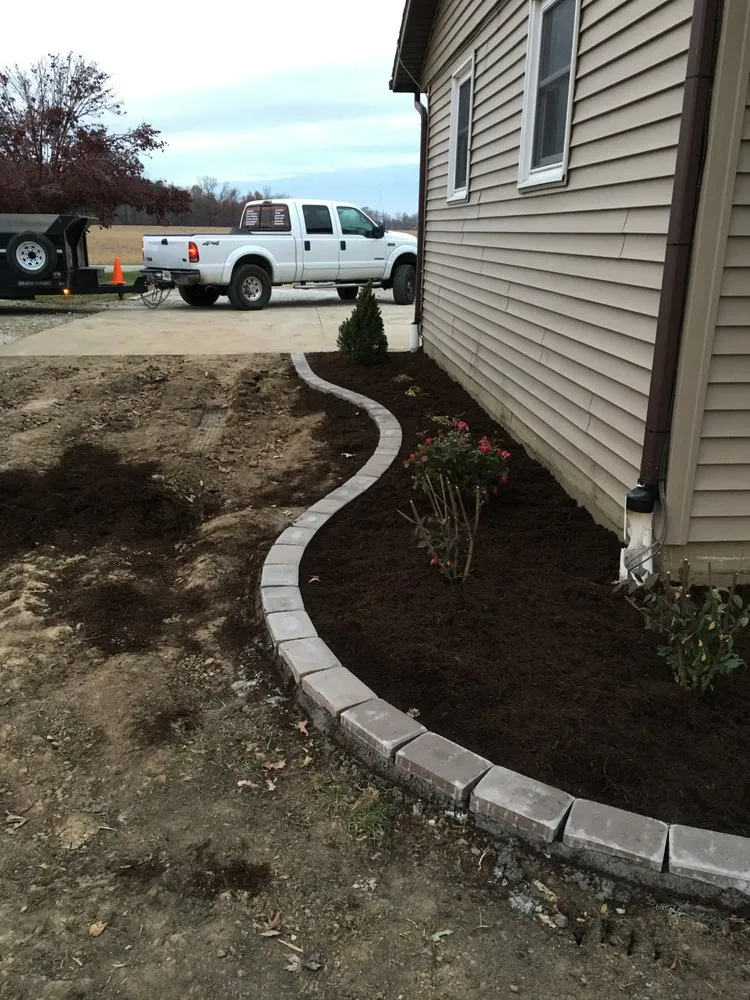 Local landscape installation with custom design in Pesotum, IL by Outdoor Designs Illinois