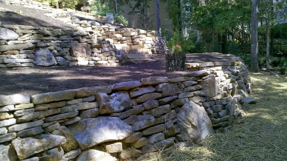 Custom yard maintenance for year-round maintenance in Powell, TN by Outdoor Designs