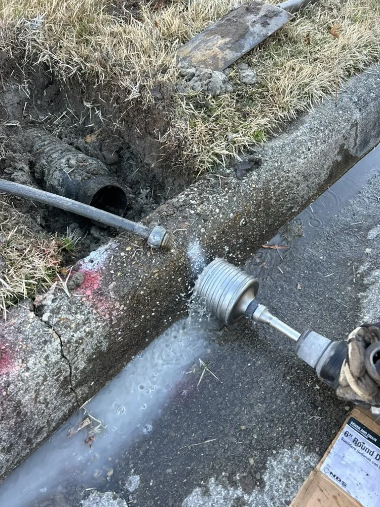 Custom landscape design for homes in Chesapeake, VA by Outdoor Drainage Solutions