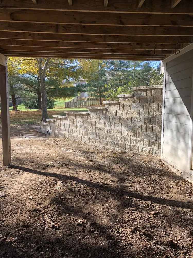 Professional yard cleanup service for homes in Blue Springs, MO by Outdoor Escapes