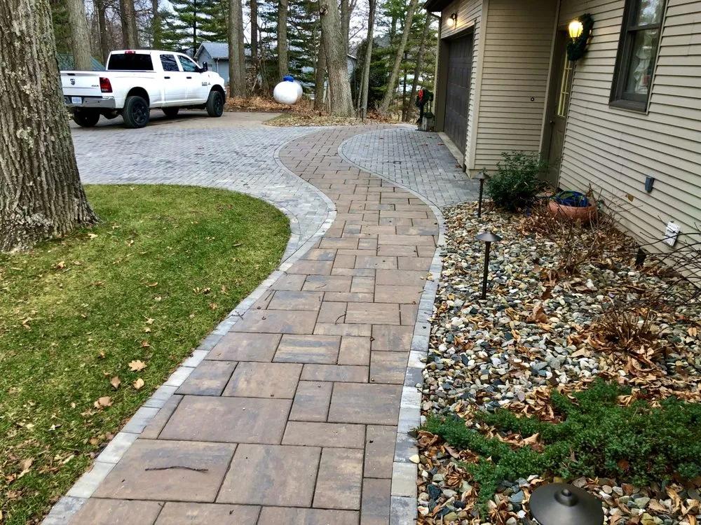 Expert lawn mowing service with custom design across Parma, MI - Outdoor Impressions